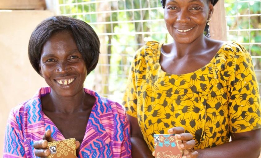Cocoa farmers with Divine Chocolate bar
