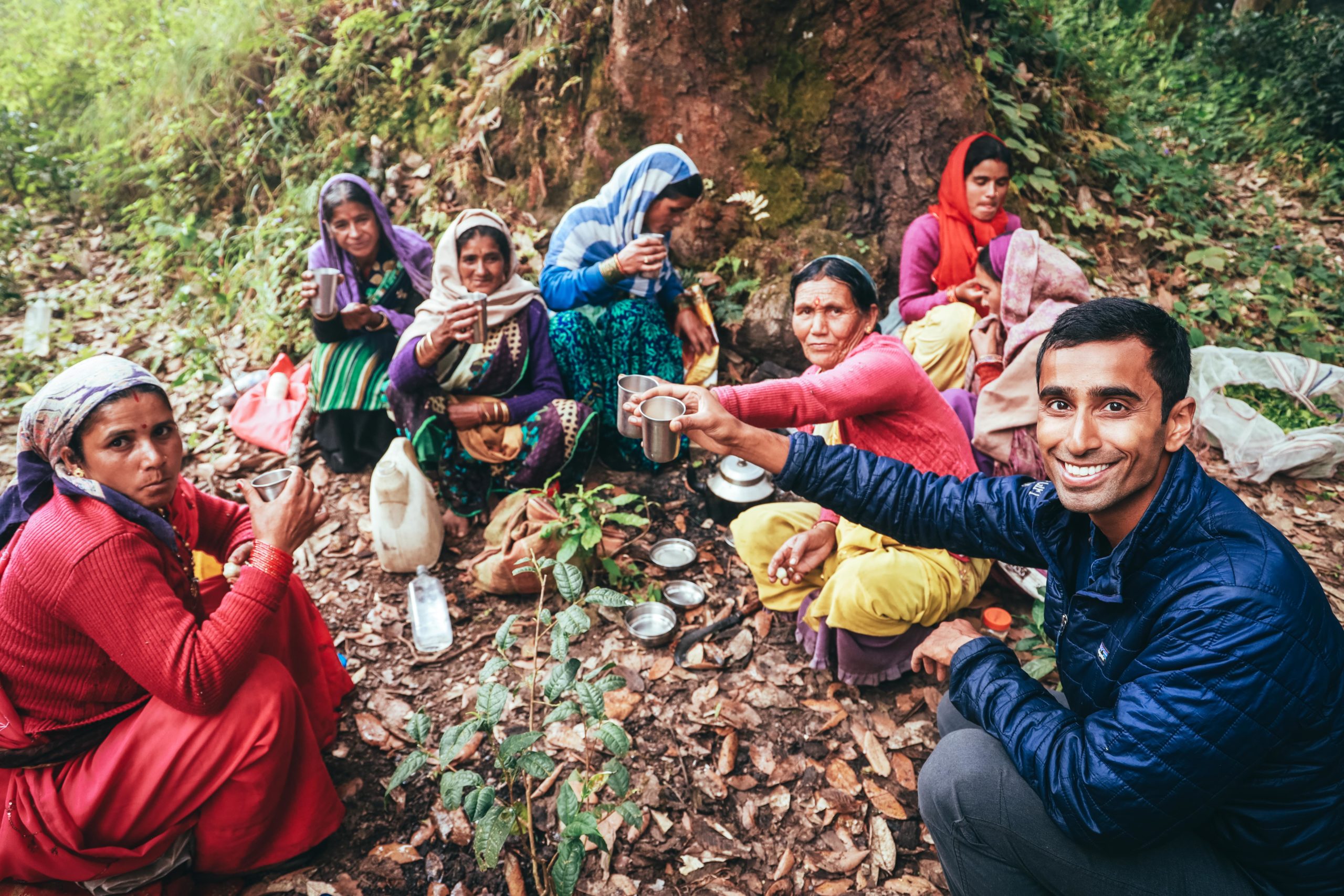 Young Mountain Tea founder Raj cheers tea farmers.