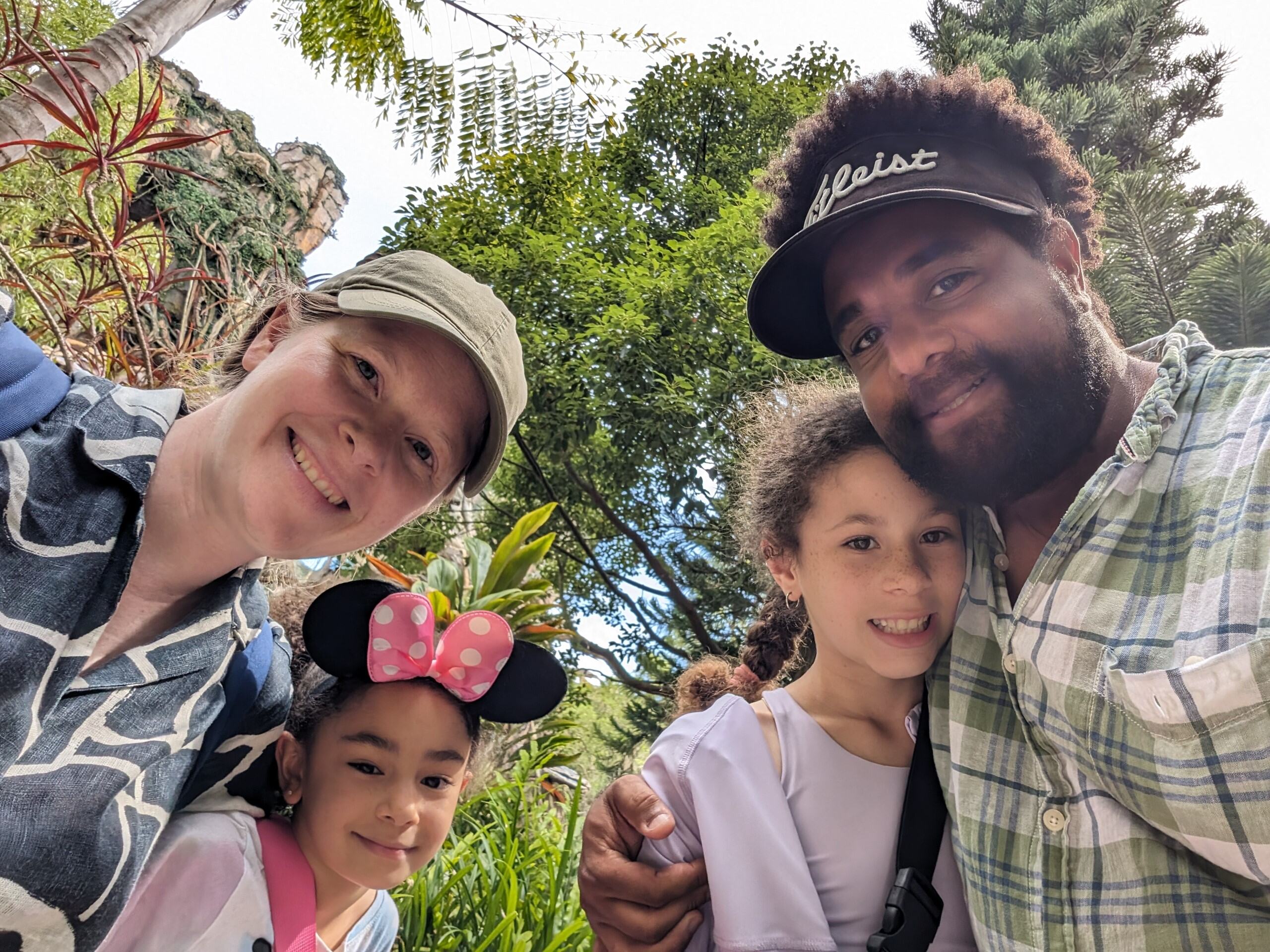 PHOTO:  Kevin with his wife Melissa and daughters Iriana (left) and Acacia (right) during their visit to Kevin's mother's family in Tanzania